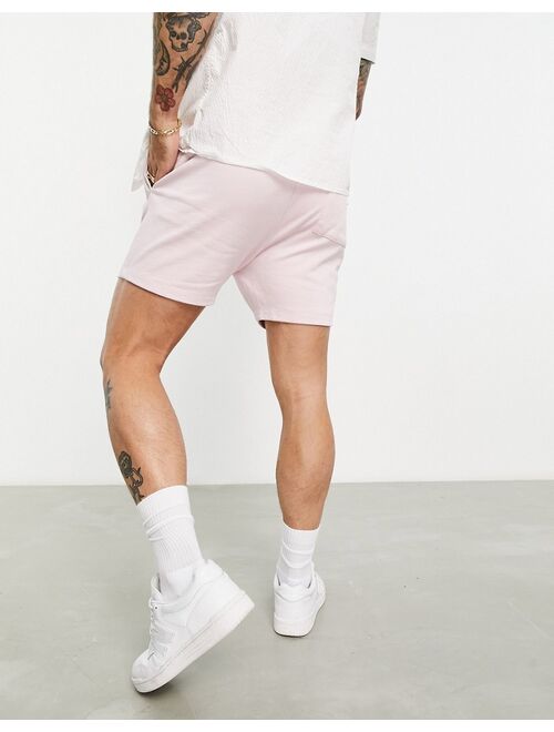 ASOS DESIGN skinny jersey shorter length shorts in pink