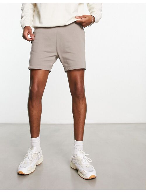 ASOS DESIGN skinny jersey shorter length shorts in beige