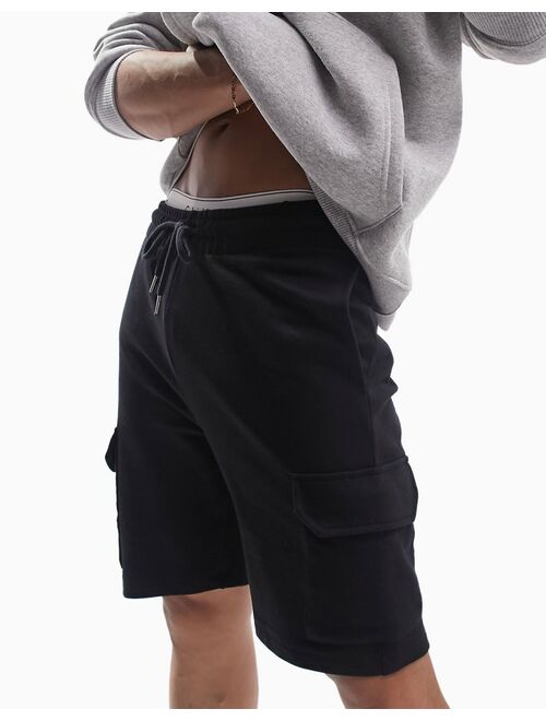 ASOS DESIGN jersey shorts with cargo pockets in black
