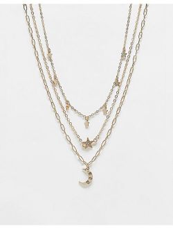 multirow necklace with celestial charms in gold tone
