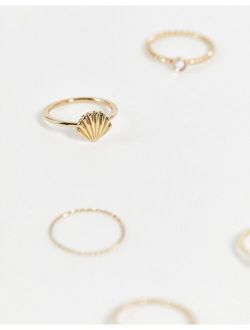 River Island pack of 7 rings with shell design in gold tone