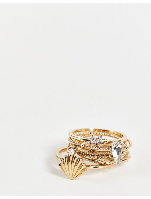 River Island pack of 7 rings with shell design in gold tone