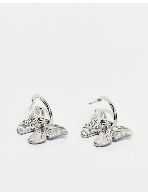 River Island huggie hoops with butterfly shape charm