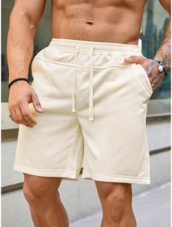 Men Solid Drawstring Waist Shorts