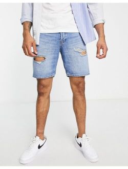 Intelligence loose fit denim shorts with rips in light blue