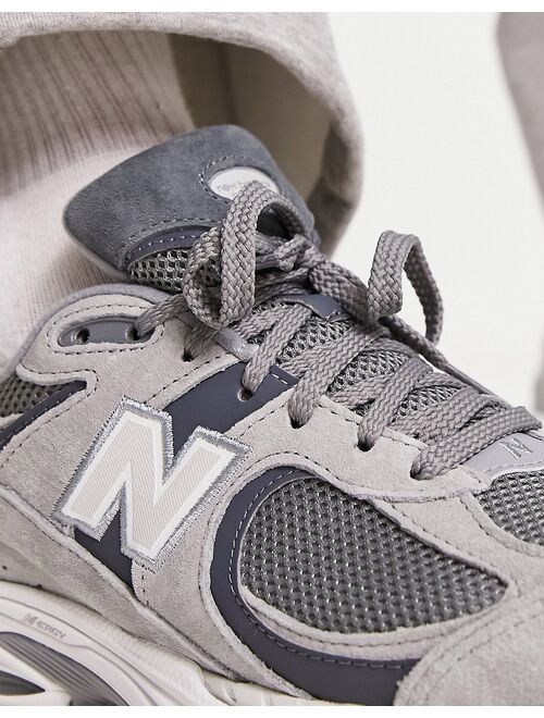 New Balance 2002 sneakers in gray multi