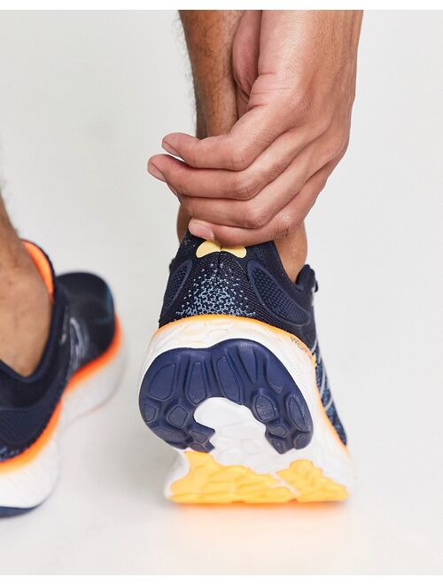 New Balance Running 1080 sneakers in navy and orange
