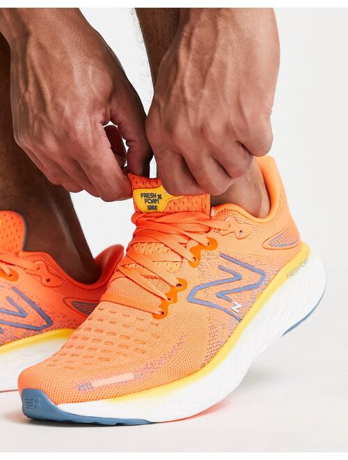 New Balance Running 1080 sneakers in orange