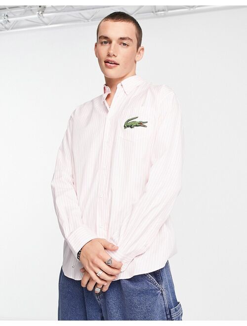 Lacoste oversized stripe shirt in pink