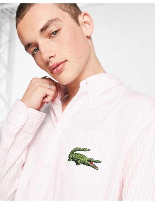 Lacoste oversized stripe shirt in pink
