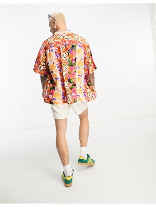 ASOS DESIGN boxy oversized revere shirt in vertical photographic floral print