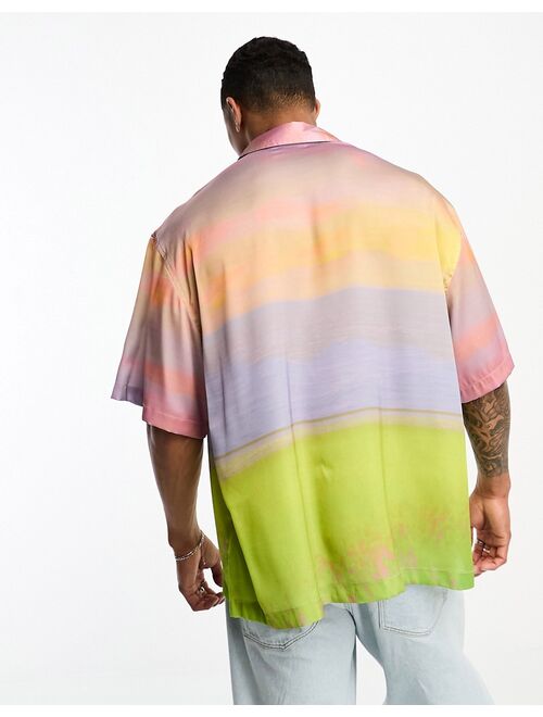 ASOS DESIGN boxy oversized satin shirt in pastel scenic print