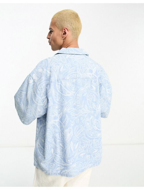 ASOS DESIGN boxy oversized revere denim shirt with paisley print