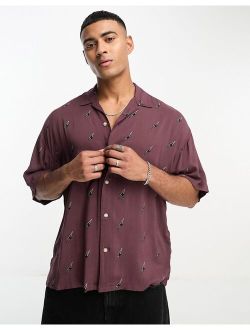 ADPT oversized revere collar short sleeve shirt with lightning print in burgundy
