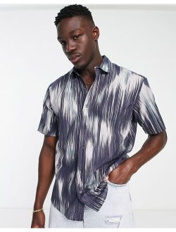 blurry peacock shirt in navy and white