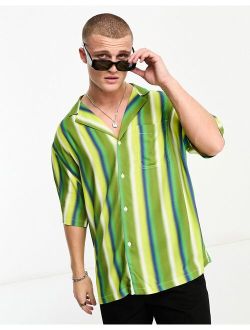 oversized revere longline bowling shirt in green blurred stripe