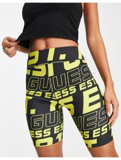 logo active legging shorts in black and yellow - part of a set