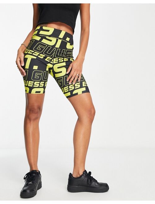 Guess logo active legging shorts in black and yellow - part of a set