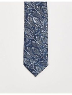 Twisted Tailor tie in blue with peacock design