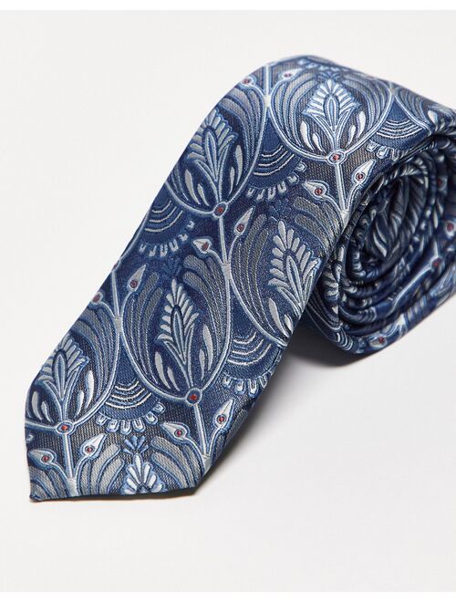 Twisted Tailor tie in blue with peacock design