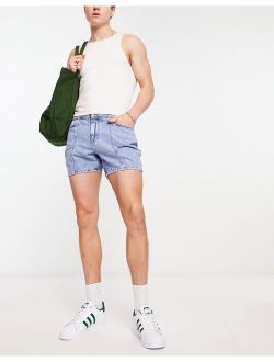 denim shorts in shorter length with seam detail in mid blue wash
