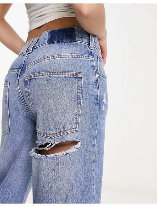 ASOS DESIGN baggy boyfriend jean in mid blue with cheeky rips