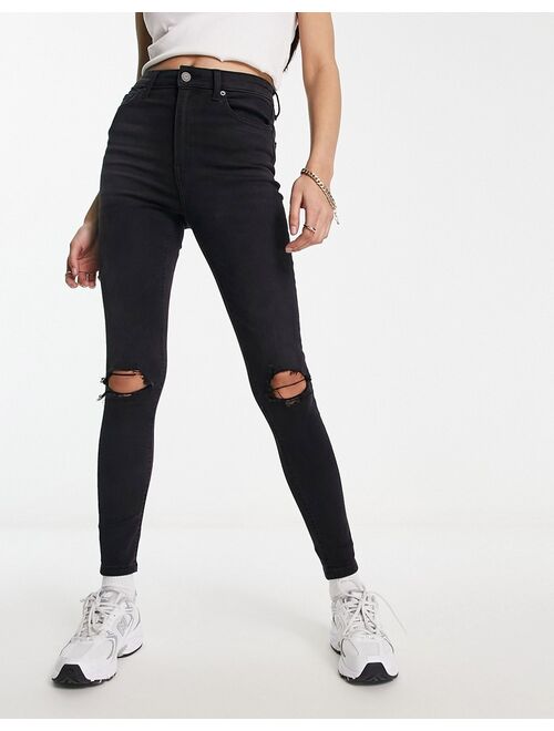 ASOS DESIGN ultimate skinny jeans in black with knee rips