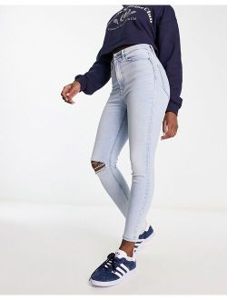 skinny jeans with rip in light blue