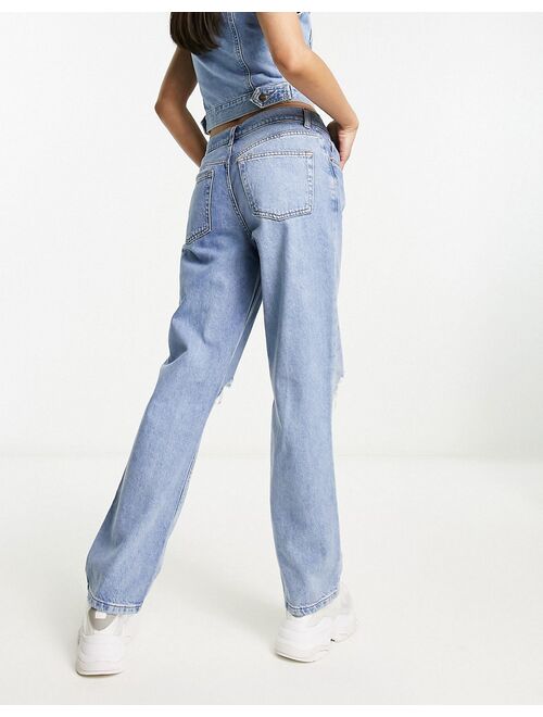 ASOS DESIGN loose straight jeans with knee rips in light blue