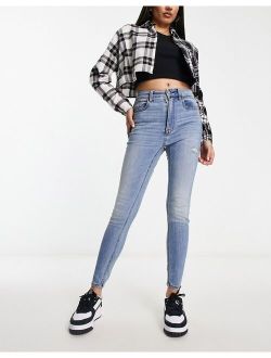 high waist skinny jeans in medium blue