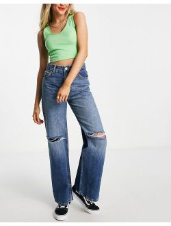 high waisted wide leg frayed hem jean with rips in blue