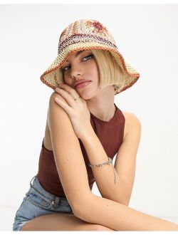 straw crochet bucket hat with floral design in neutral multi