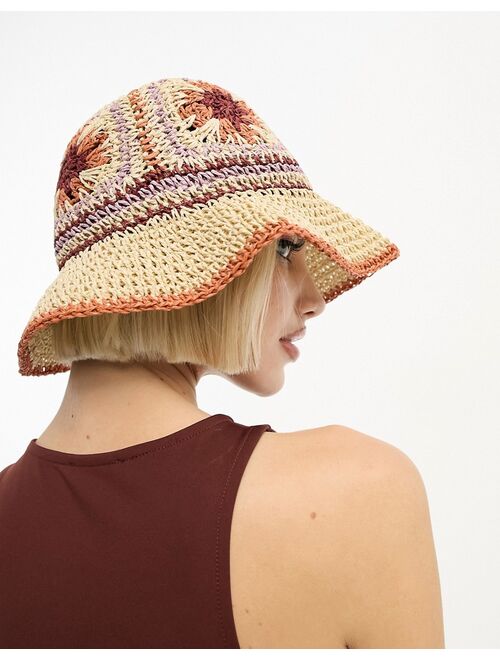 ASOS DESIGN straw crochet bucket hat with floral design in neutral multi