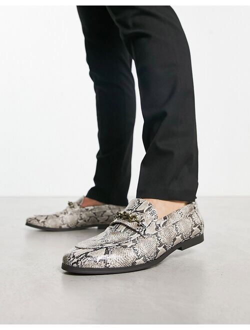 ASOS DESIGN loafers with snaffle detail in snake print faux leather