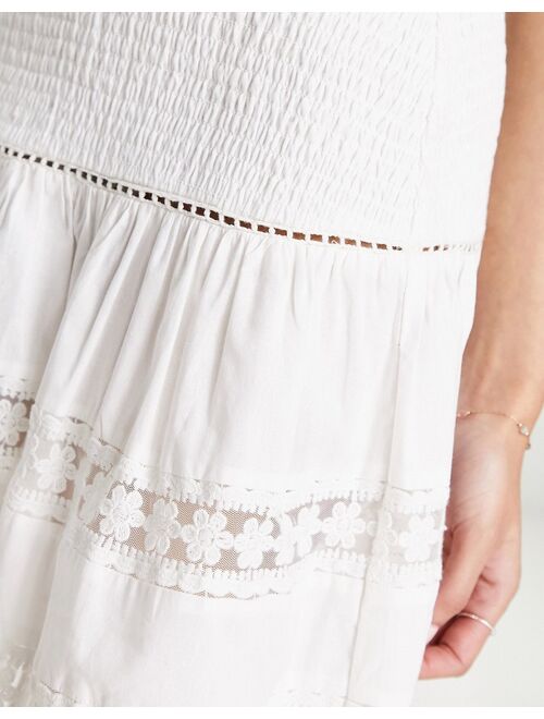 ASOS DESIGN prairie mini skirt with shirred waist and lace inserts in white