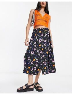 button through midi skirt in black floral print