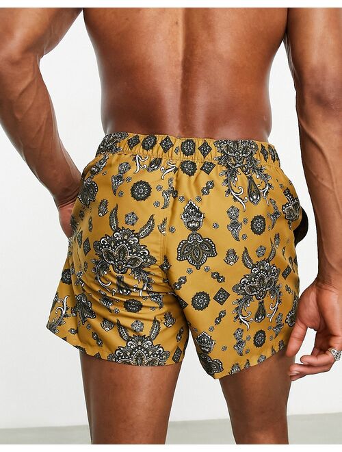 ASOS DESIGN swim shorts in short length in paisley print