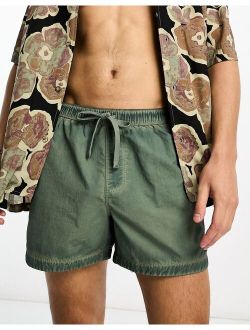 swim shorts in short length in washed green