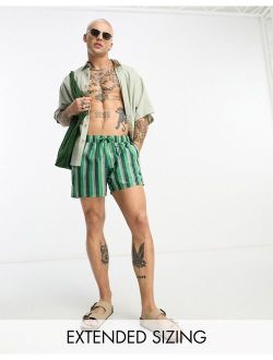 swim shorts in short length in green stripe