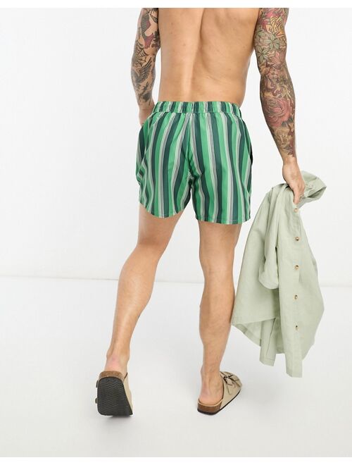 ASOS DESIGN swim shorts in short length in green stripe