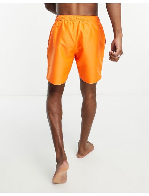 ASOS DESIGN swim shorts in mid length in orange