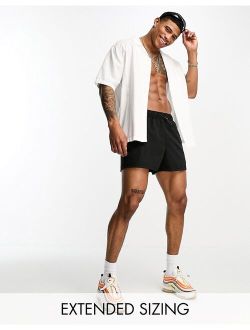 swim shorts in short length with cargo pockets in black