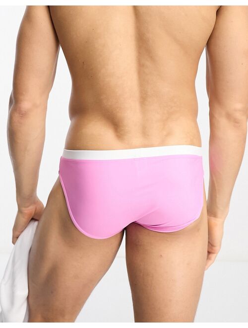 ASOS DESIGN swim briefs with contrast waistband in pink