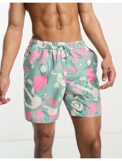 swim shorts in mid length in abstract print