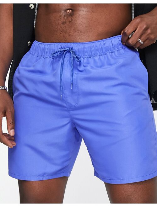 ASOS DESIGN swim shorts mid length in blue