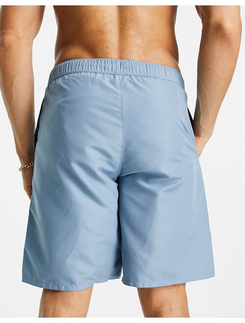 ASOS DESIGN swim shorts in long length in mid blue