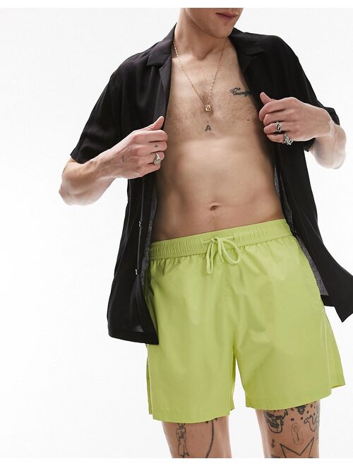 Topman swim shorts in neon green