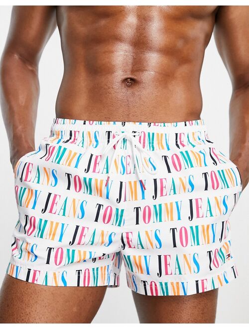 Tommy Hilfiger Tommy Jeans polyester swim shorts with all over text print - WHITE