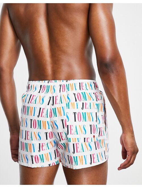 Tommy Hilfiger Tommy Jeans polyester swim shorts with all over text print - WHITE