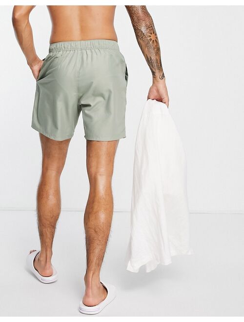 ASOS DESIGN swim shorts in mid length in light khaki
